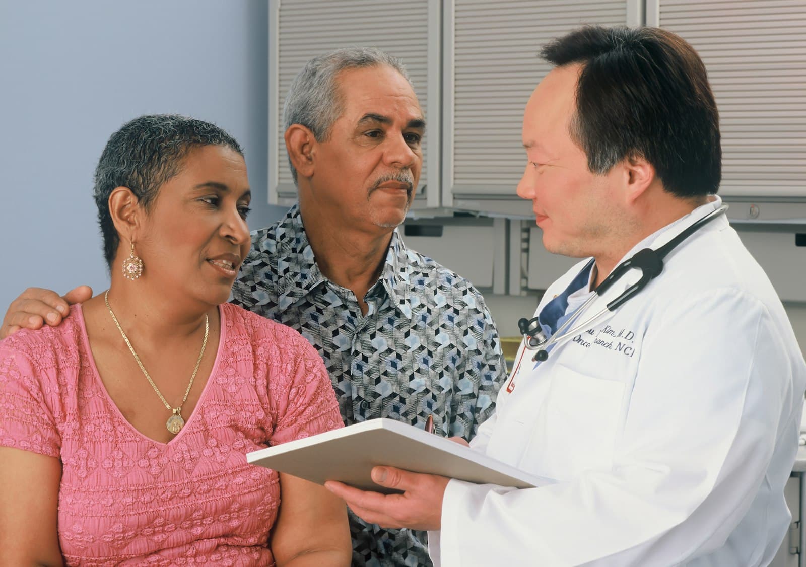 Doctor reviewing patient records on a tablet