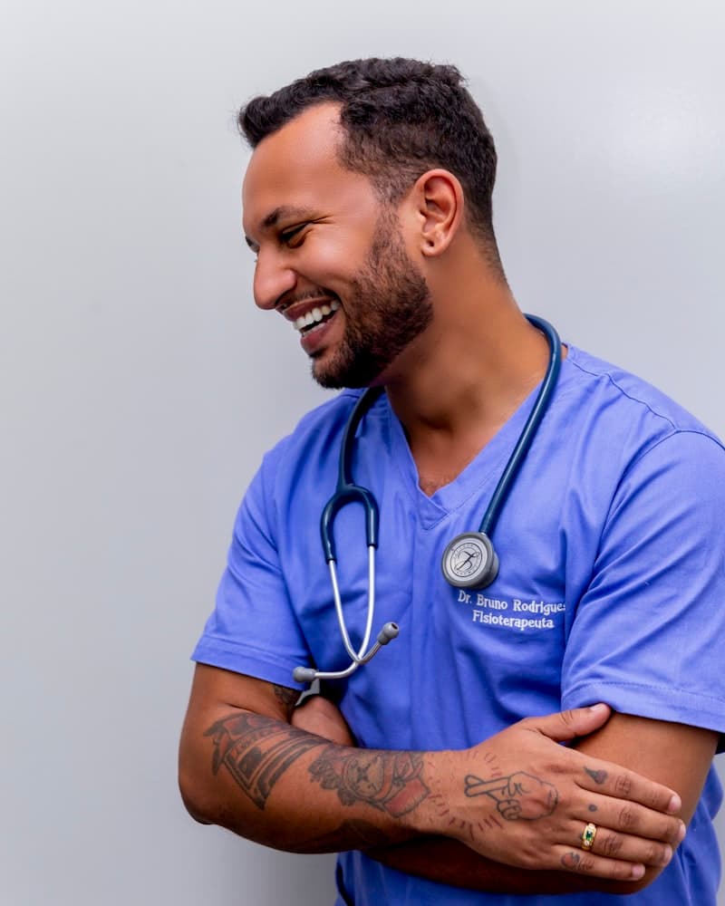 Doctor in blue scrubs with a stethoscope